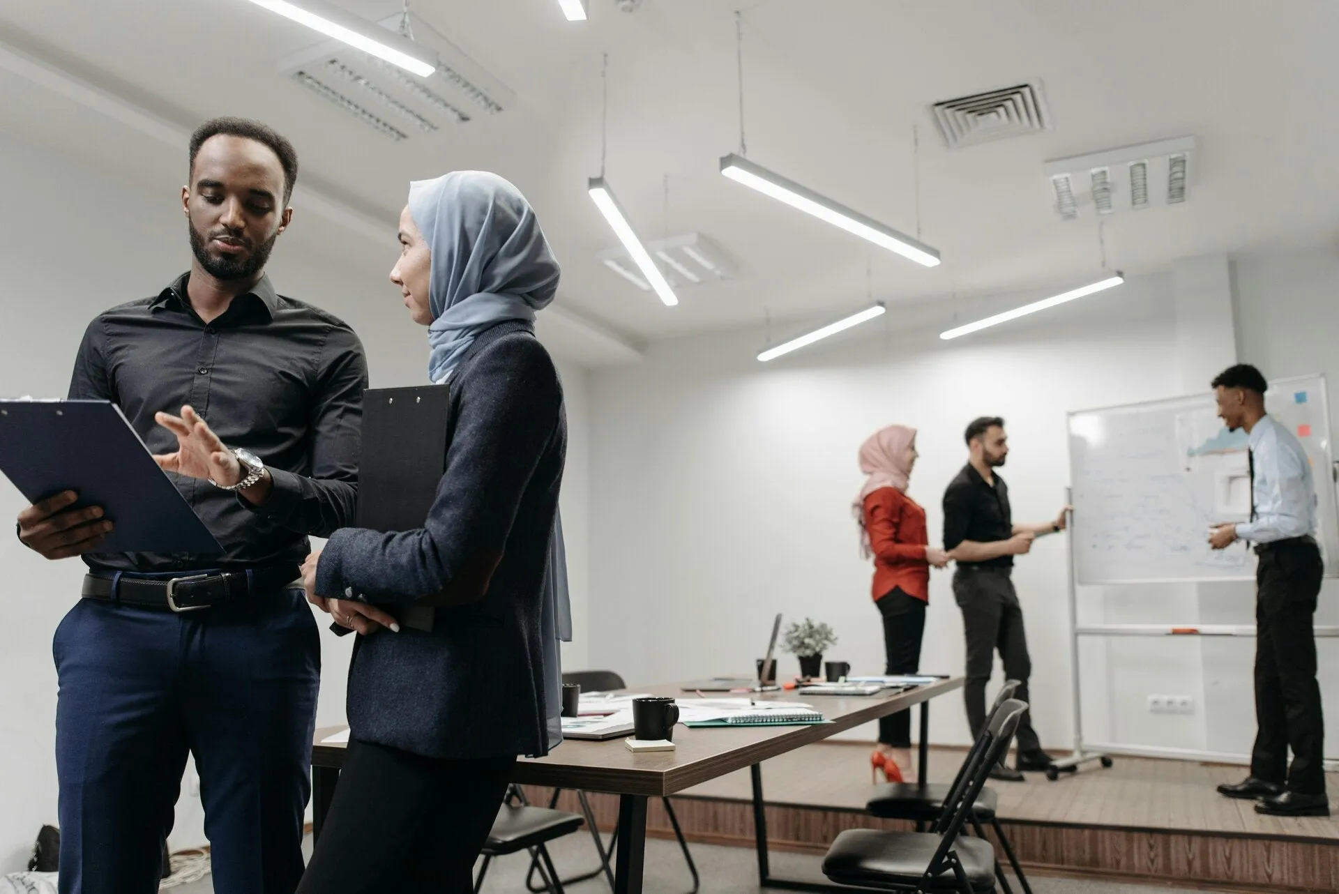 Team discussing work together in an office