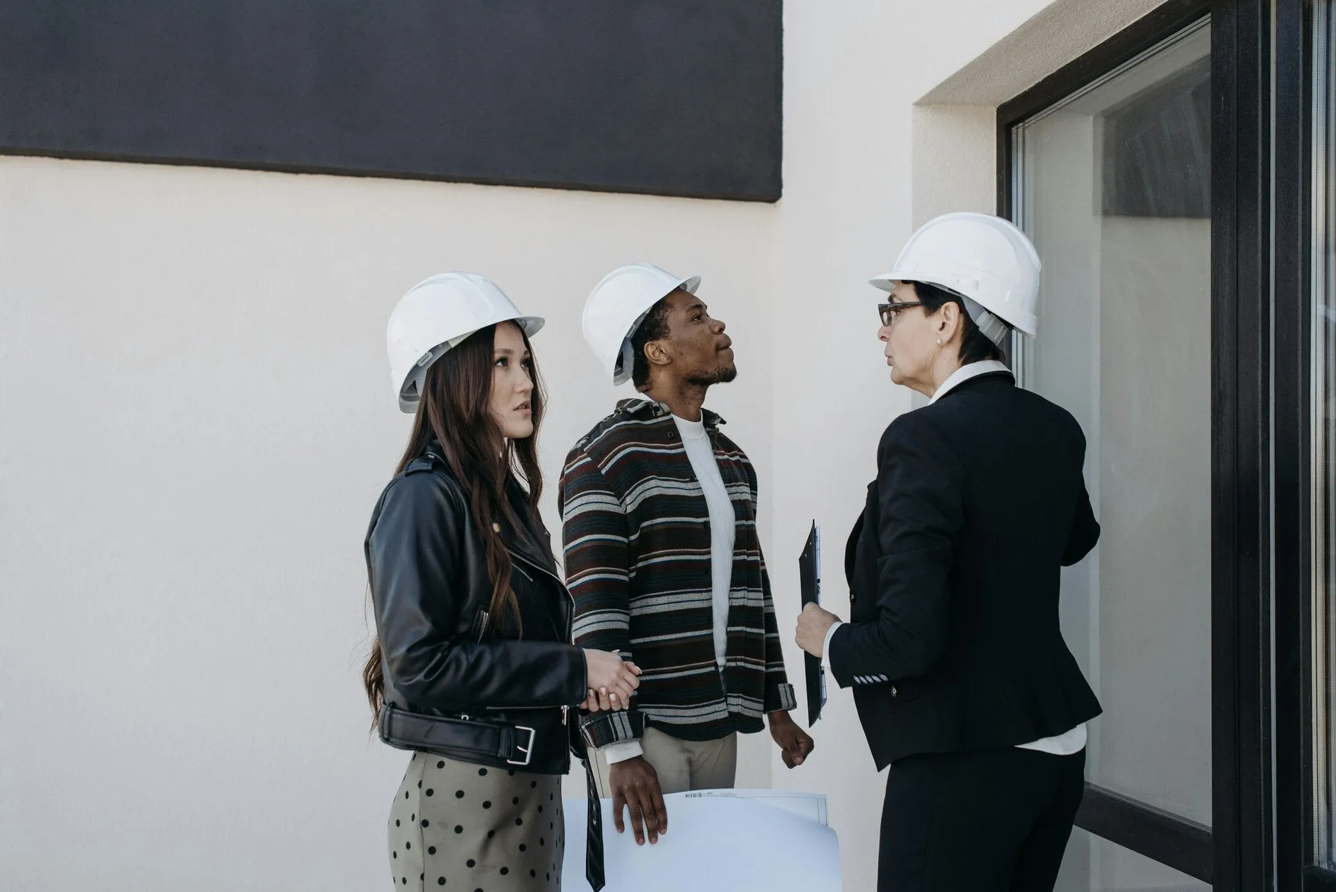 Team members meeting at a property