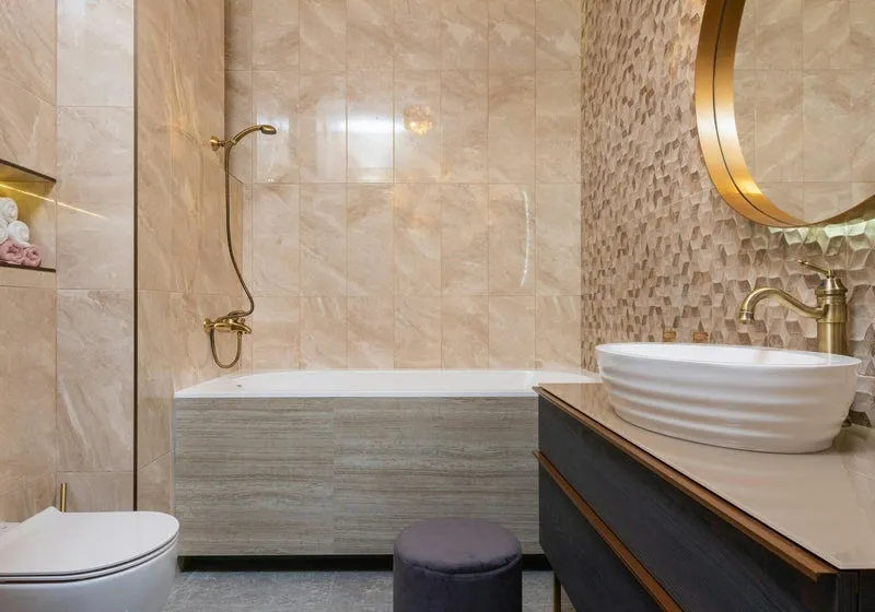 Renovated bathroom with tile and tub